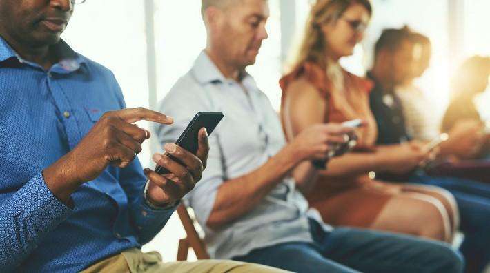 People on mobile phones
